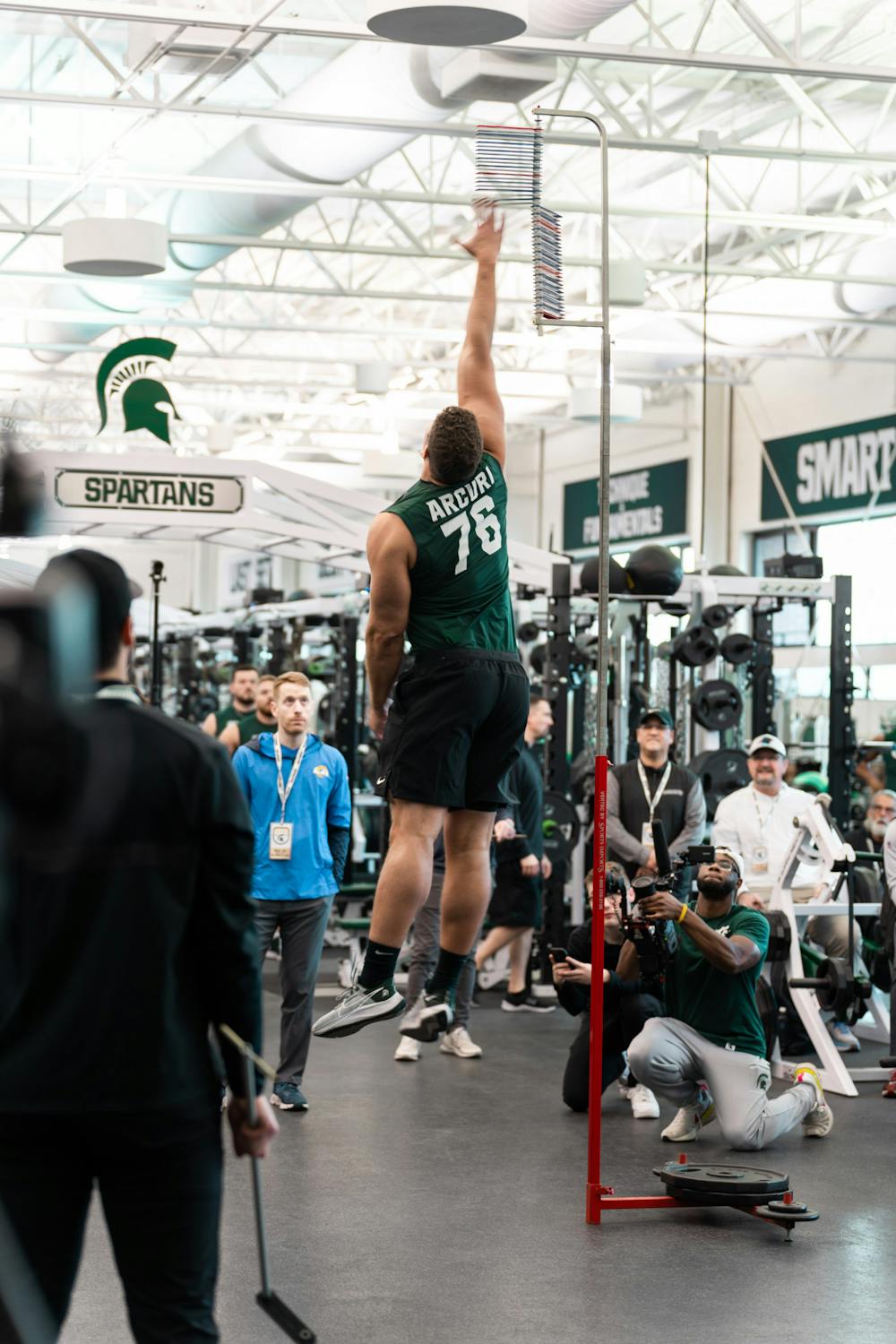 <p>Michigan State graduate student AJ Arcuri with an impressive vertical leap of 33.5 inches, on Mar. 16, 2022 at the Duffy Daugherty Indoor Football Building.</p>