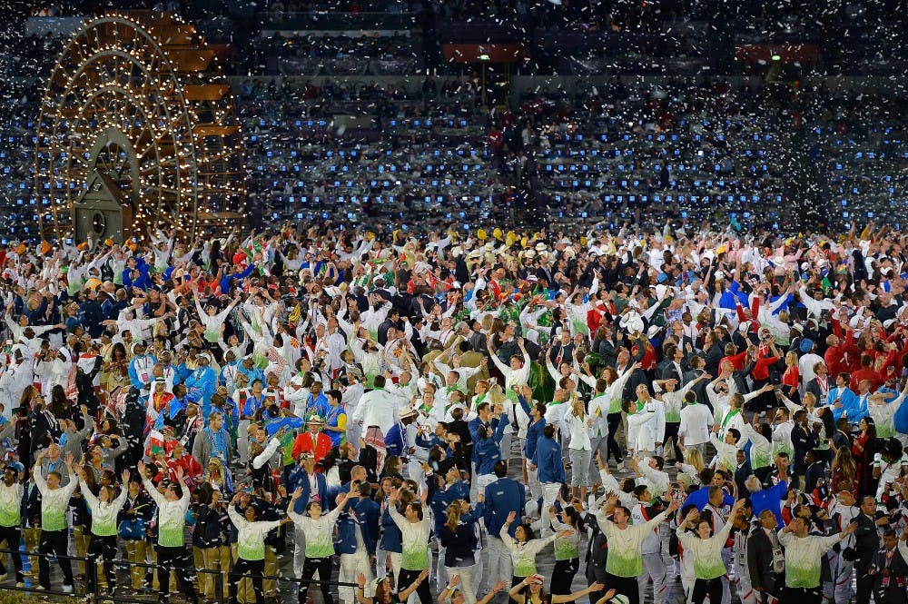 Confetti showers down on the Olympic athletes during the Opening Ceremony for the London 2012 Summer Olympic Games at the Olympic Stadium in London, England, Friday, July 27, 2012. (David Eulitt/Kansas City Star/MCT)