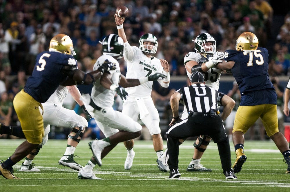 Senior quarterback Tyler O'Connor (7) throws a pass during the game against Notre Dame on Sept. 17, 2016 at Notre Dame Stadium in South Bend, Ind.  The Spartans defeated the Fighting Irish, 36-28.