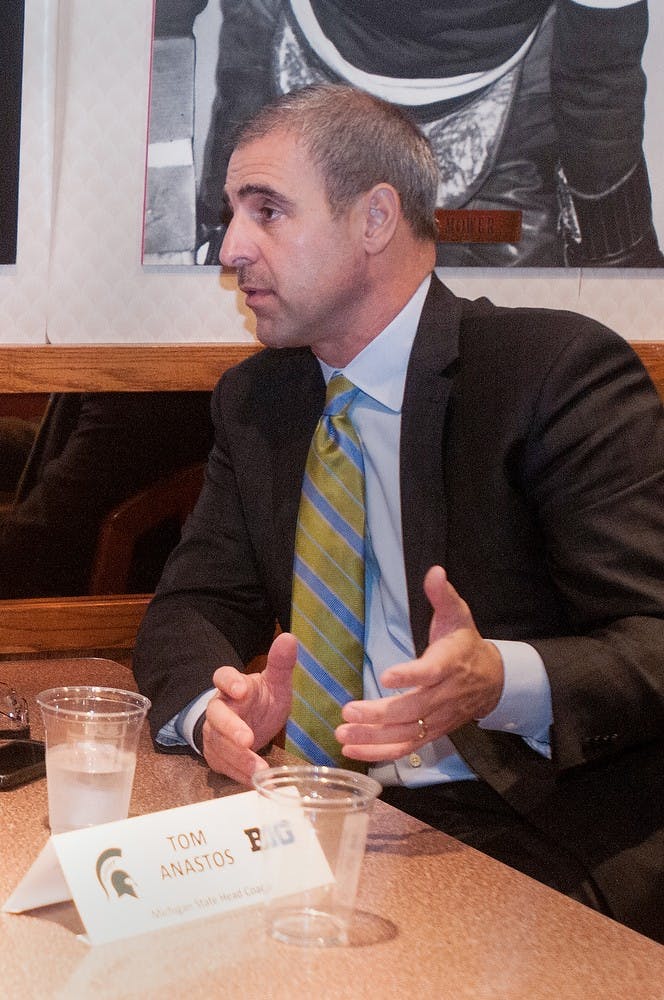 <p>Hockey head coach Tom Anastos speaks to the media Sept. 24, 2014, at Joe Louis Arena in Detroit. Aerika Williams/The State News</p>