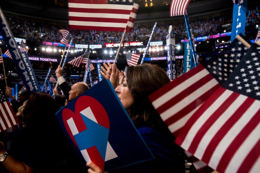 A Delegate from New York cheers while listening to Hillary Clinton speak on the final day of the Democratic National Convention on July 28, 2016 at Wells Fargo Center in Philadelphia. 
