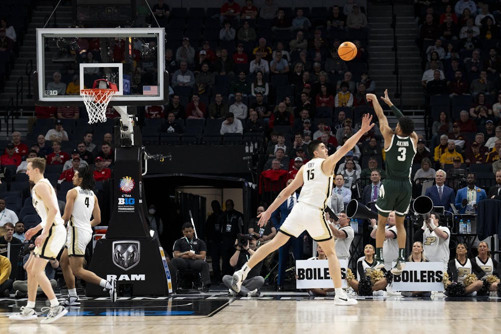 <p>Michigan State junior guard No. 3 Jaden Akins shoots the ball against Purdue in the Quarterfinals of the Big Ten Tournament in Minneapolis, March 15, 2024. The Spartans looked to upset Purdue, but ultimately fell to the Boilermakers 67-62. </p>