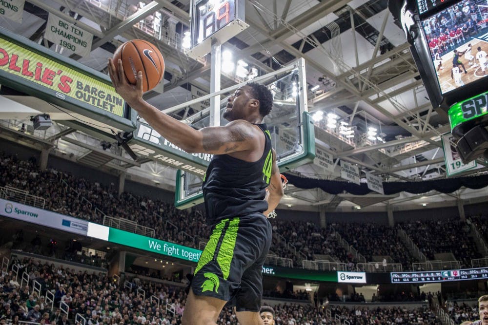 <p>Sophomore forward Nick Ward (44) saves a ball from going out of bounds during the game against Indiana on Jan. 19, 2018, at the Breslin Center. The Spartans defeated the Hoosiers, 85-57.</p>