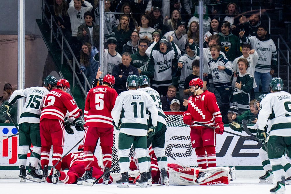 <p>MSU Fans react to a potential score during Michigan State University verses Wisconsin Hockey game at MSU's Munn Stadium in East Lansing, Mich. on Saturday, Nov. 22, 2025.</p>