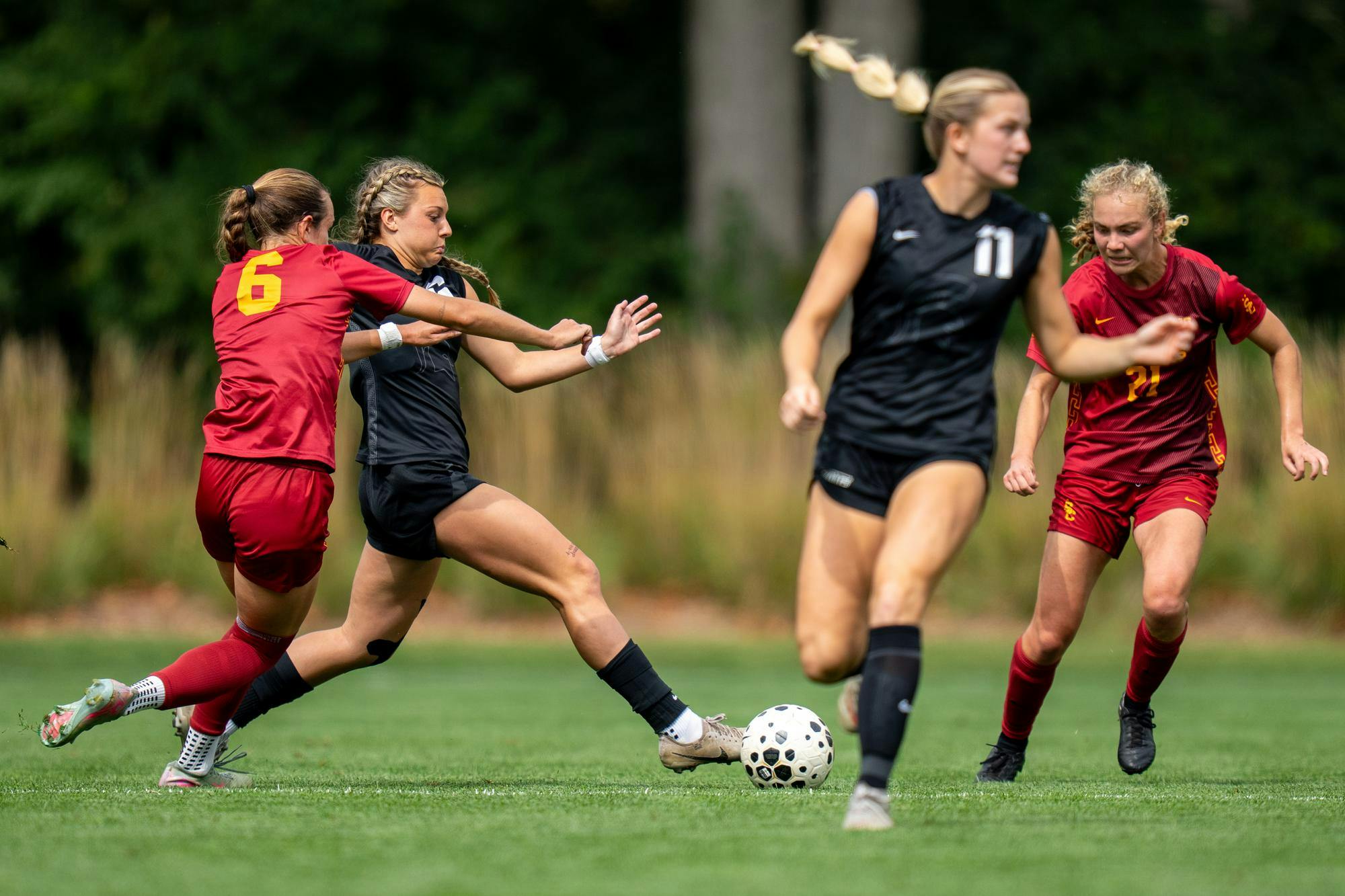 MSU midfielder, Remini Tillotson (6) gets ahead of USC midfielder, Eleanor Morrissey (6) during the MSU versus USC Women's Soccer game at Michigan State Universities DeMartin Soccer Stadium on Sunday, Sept. 21, 2025. 