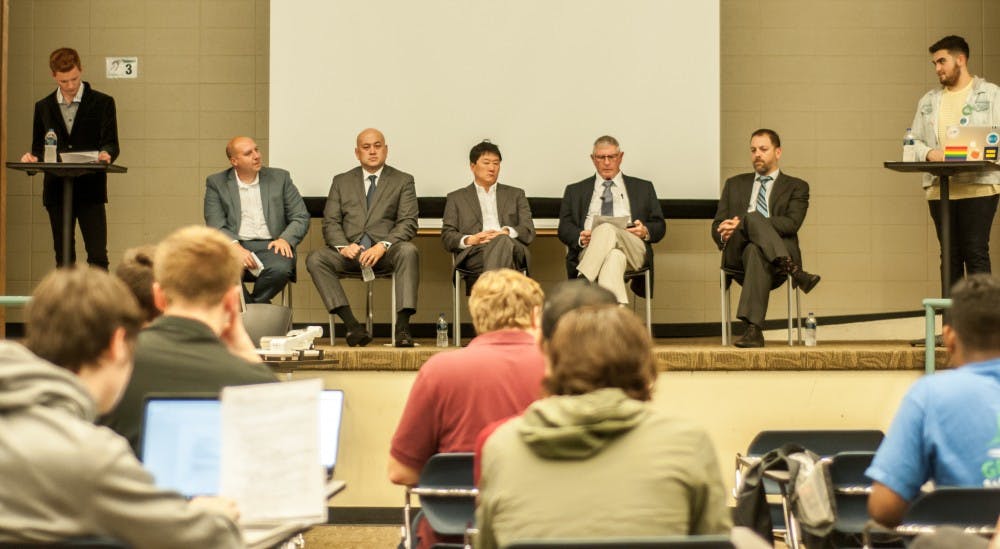 From left Senator Curtis Hertel Jr., Demetrio Timban, Senator Hoon-Yung Hopgood, Doctor Robert Schwyn, and Doctor Dan Rontal Speak to students and answer questions about healthcare policies on Oct. 10, 2018 at Erickson Hall Kiva.