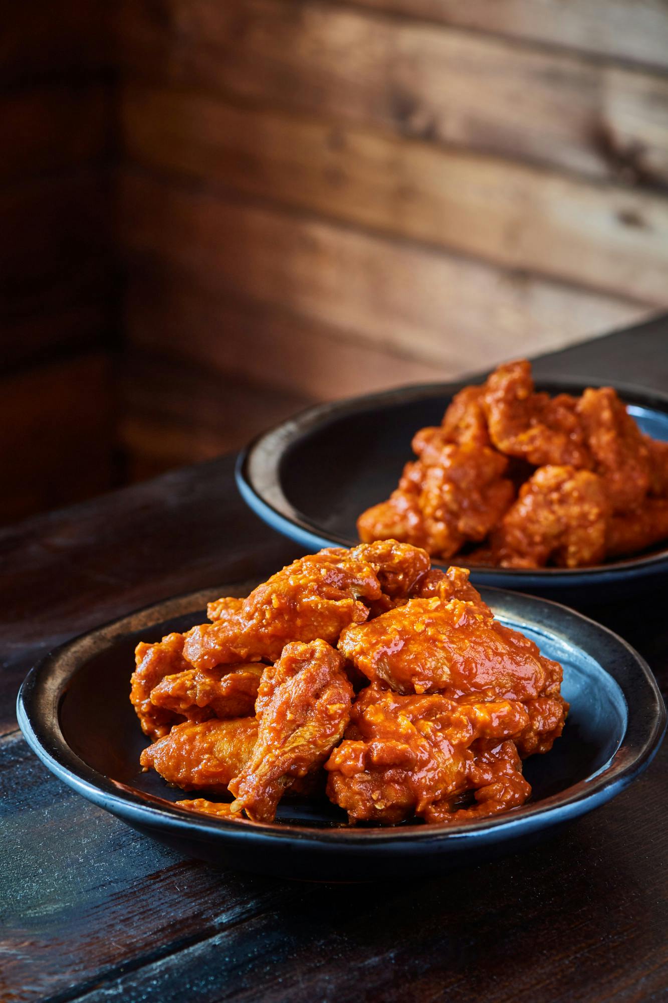 <p>Hot garlic wings from Detroit Wing Company. Photo courtesy of Near Perfect Media. </p>