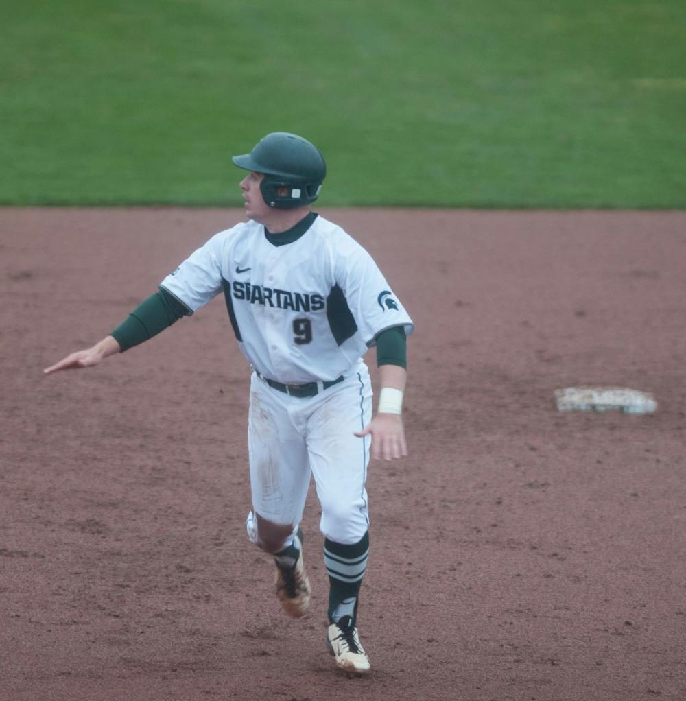 Junior infield Dan Durkin runs to third base during the baseball game against Central Michigan University  on March. 23, 2016 at McLane Stadium. Spartans won against the Chippewas 4-1. 