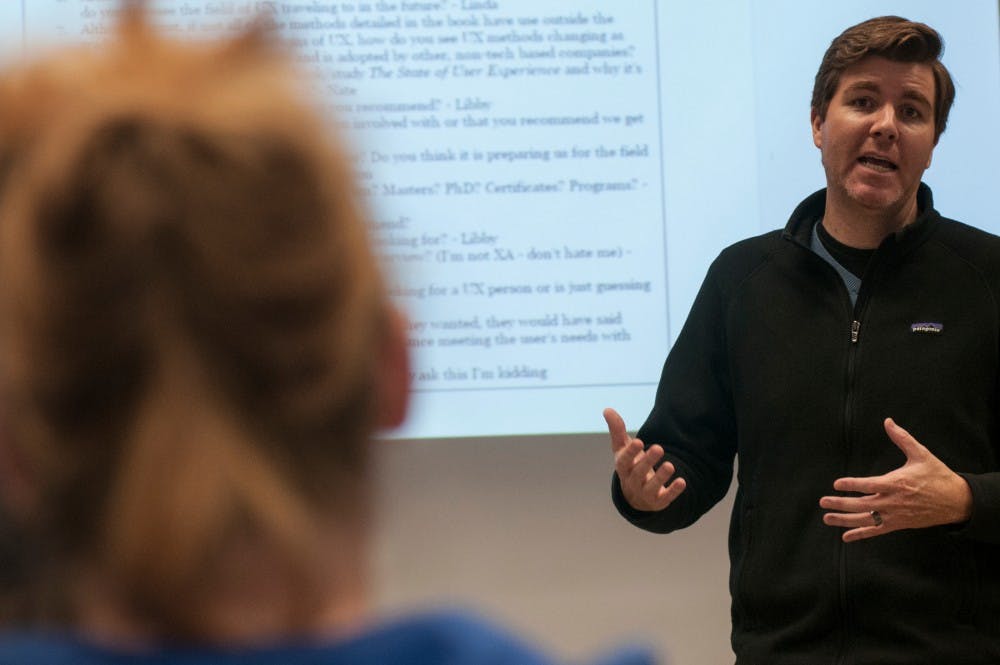 Writing Rhetoric And American Culture professor Casey McArdle teaches during an experience architecture introductory course on Nov. 22, 2016 at Berkey Hall. Students in the course are working to improve a newly-opened game room in the main library. 