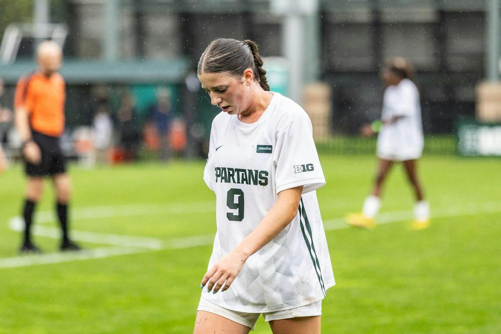 <p>Rain pours down on DeMartin Stadium as Michigan State senior midfielder Kayla Briggs (9) walks to the sidelines for a throw in during MSU's match against Michigan in East Lansing, Mich., on Sept. 20, 2026.</p>