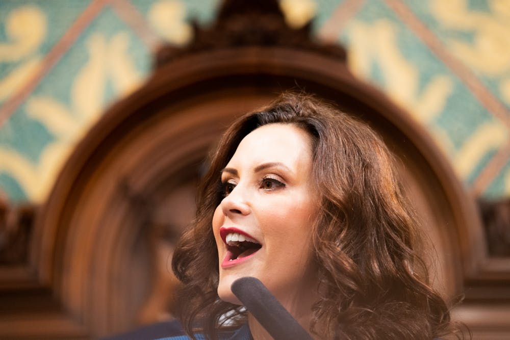  Gov. Gretchen Whitmer greets guests for the State of the State address in The House Chamber at the Capital Building in Lansing on Jan. 25, 2023. 