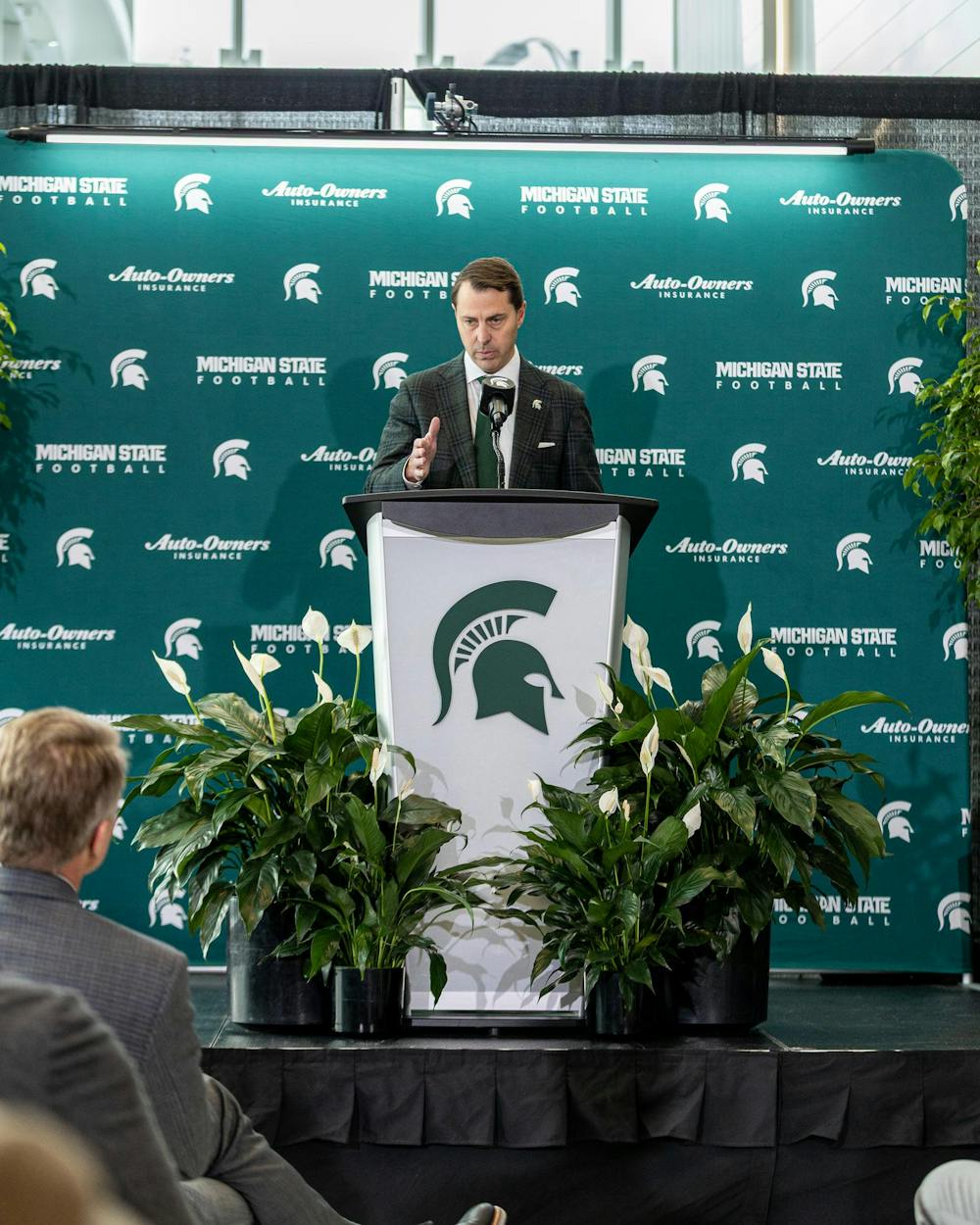 MSU AD J Batts addresses the crowd in the Tom Izzo football building in East Lansing, MI on Dec. 2, 2025.