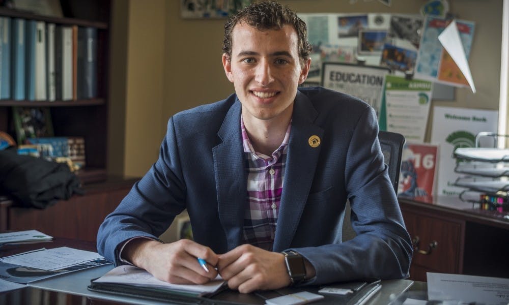 <p>International relations junior Lorenzo Santavicca poses for for a portrait on March 24, 2017 at Student Services. Santavicca was reelected to serve as ASMSU president on April 25.</p>