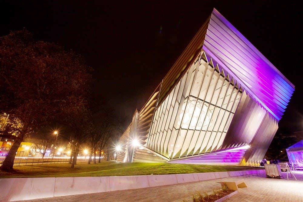 	<p>The Eli and Edythe Broad Art Museum is illuminated by lights from a private party on Friday, Nov. 9, 2012. The museum was opened to the public on Sunday, Nov. 11, 2012. Julia Nagy/The State News</p>