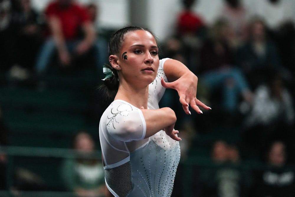 <p>Michigan State University's all around senior gymnast Baleigh Garcia on the beam against University of Illinois at the Jenison Field House on Feb. 9, 2024.</p>
