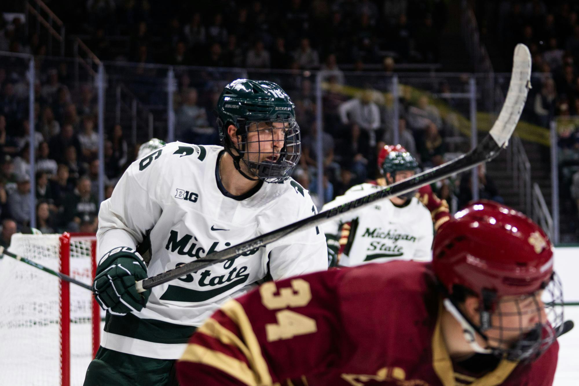 Michigan State University freshman forward Vladislav Lukashevich (16) snaps to attention during a match against Boston College at Munn Ice Arena on Oct. 11, 2024.