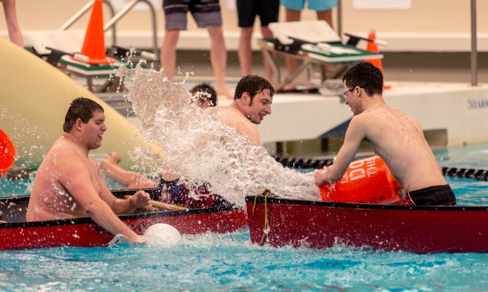 A player closes his eyes before being splashed during a game of battleship at IM Sports West on April 19, 2019. 
