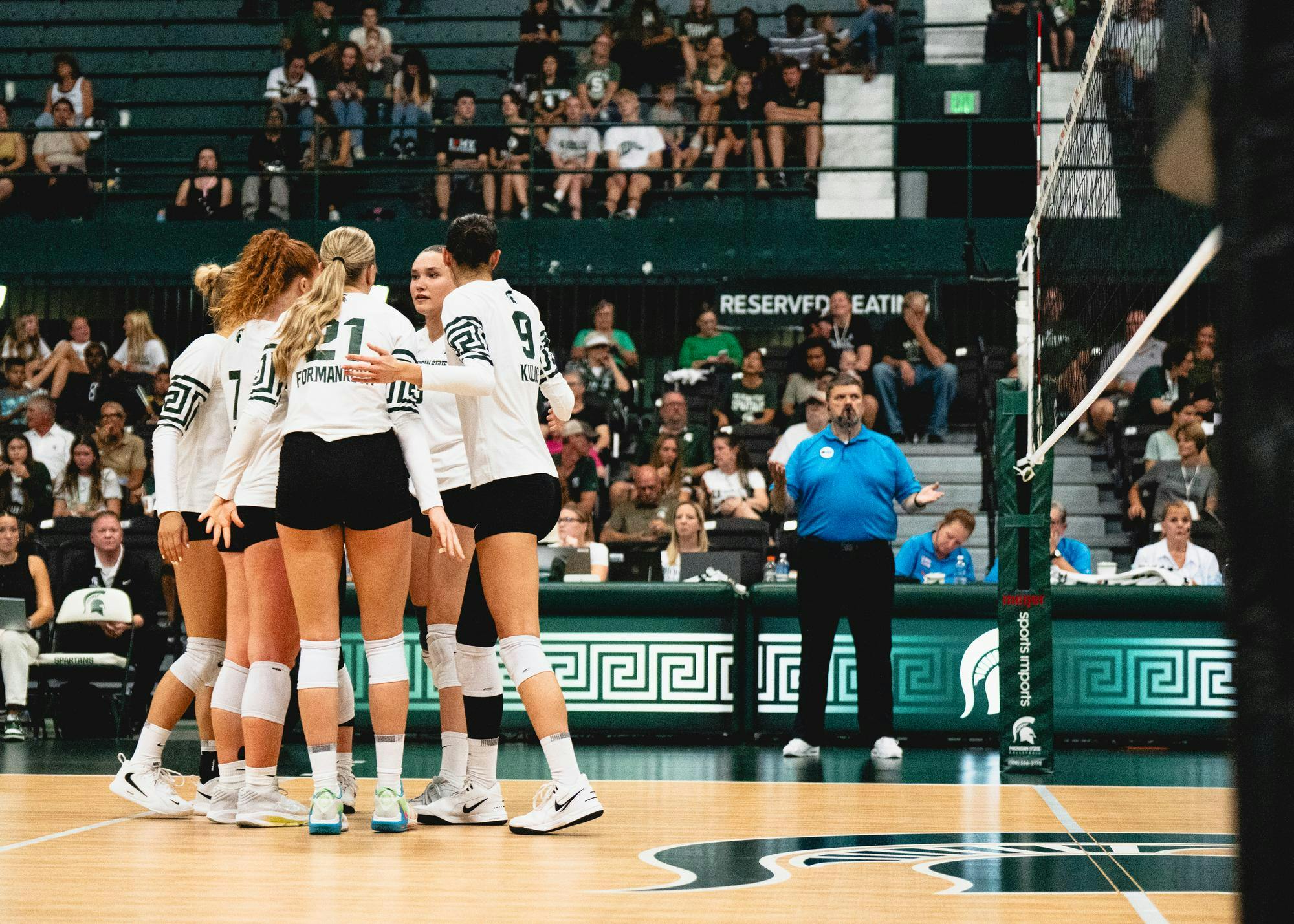 <p>The MSU volleyball team celebrates together as a group at the Jenison Fieldhouse in East Lansing, MI on Sept. 20, 2025</p>