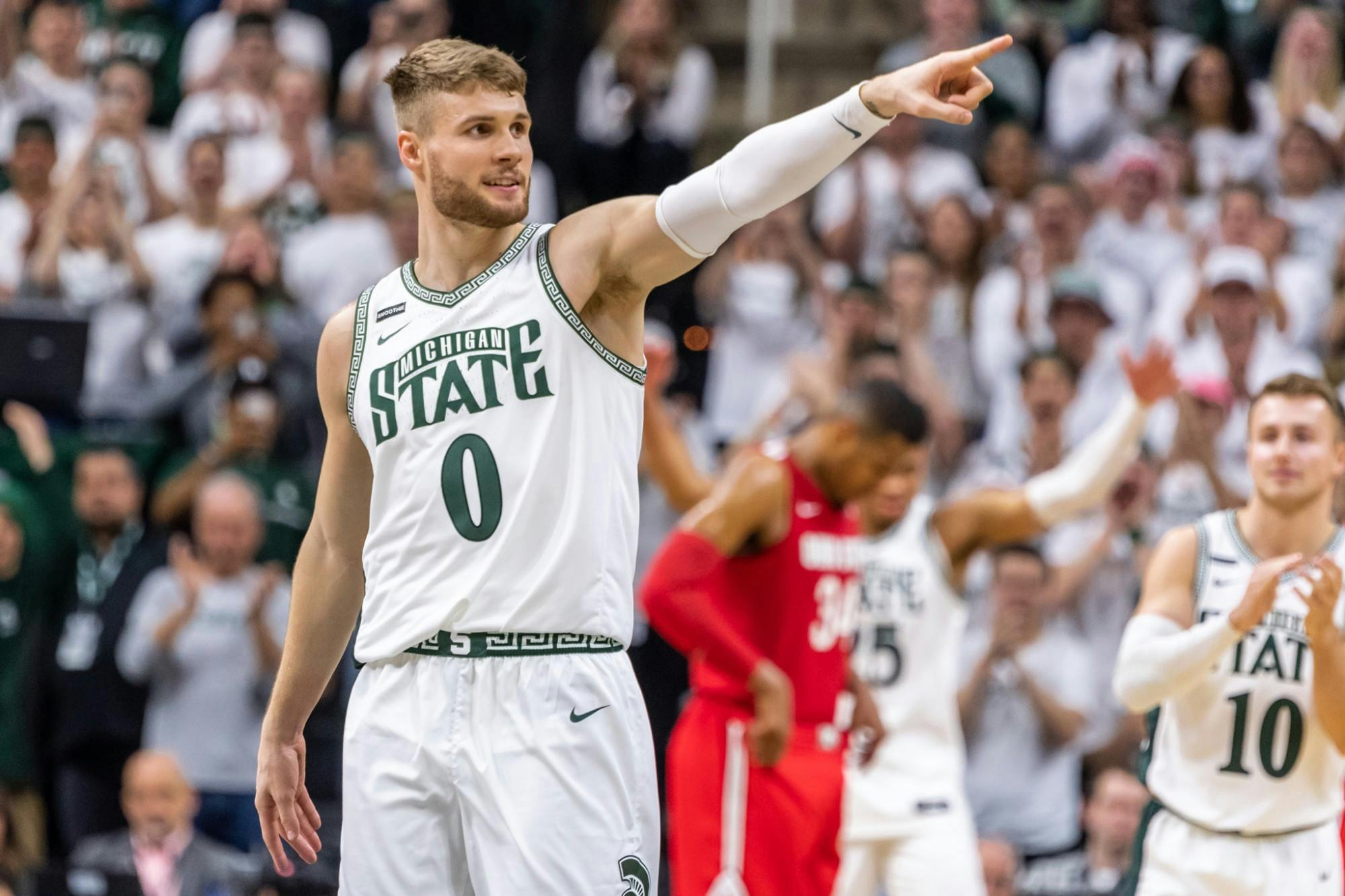 <p>Senior forward Kyle Ahrens is subbed out on his senior day against Ohio State. The Spartans defeated the Buckeyes, 80-69, on March 8, 2020 at the Breslin Student Events Center.</p>