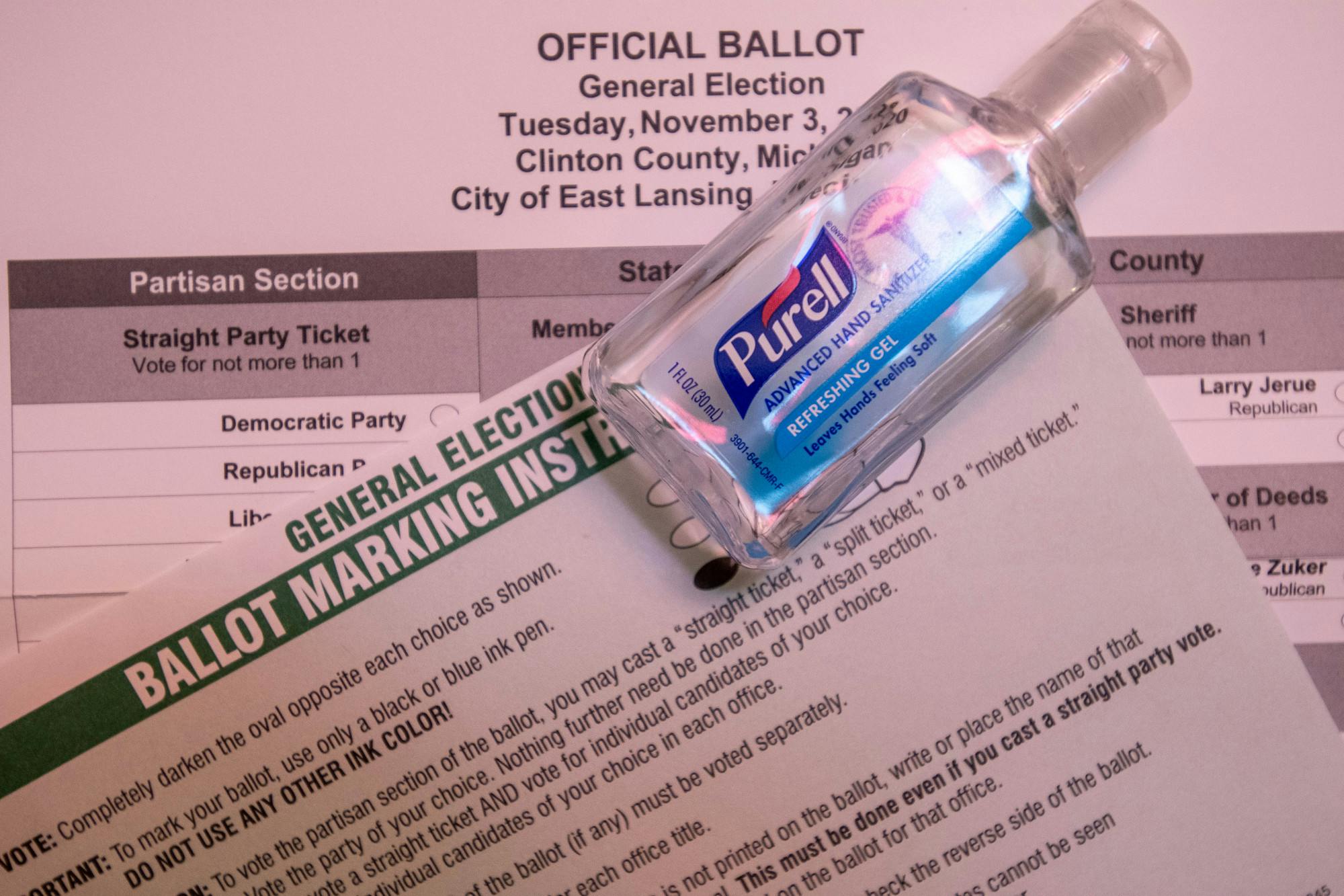 A 2020 ballot and hand sanitizer.