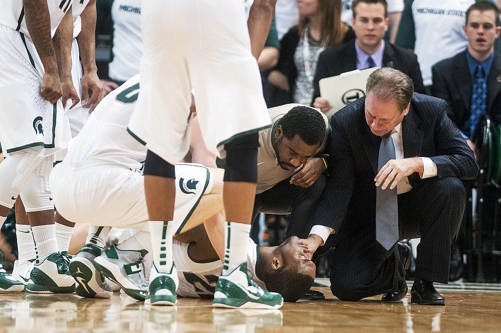 	<p>Sophomore guard Branden Dawson lies injured on Jan. 13, 2013, at the Breslin Center. The Spartans defeated the Huskers 66-56. Julia Nagy/The State News</p>