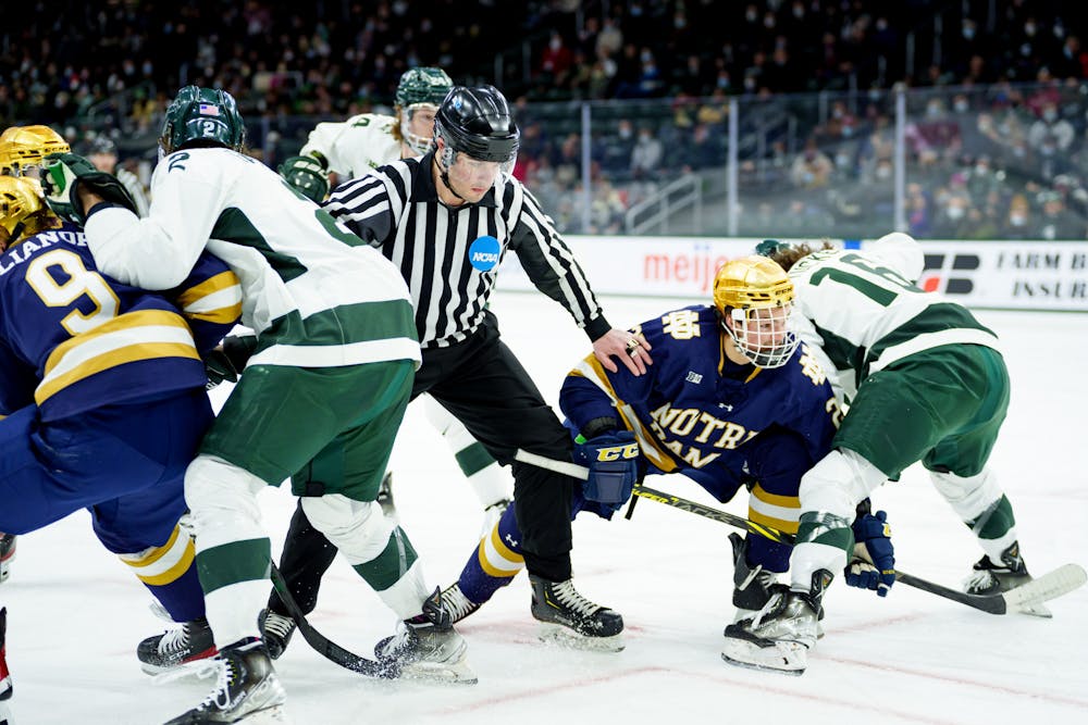 <p>After a face-off between Michigan State freshman Jesse Tucker and Notre Dame junior Solag Bakich, a clash between Tucker and Bakich as well as between Michigan State sophomore Aiden Gallacher and Notre Dame sophomore Grant Silianoff on Feb. 19, 2022. Spartans lost 4-2 against Notre Dame.</p>