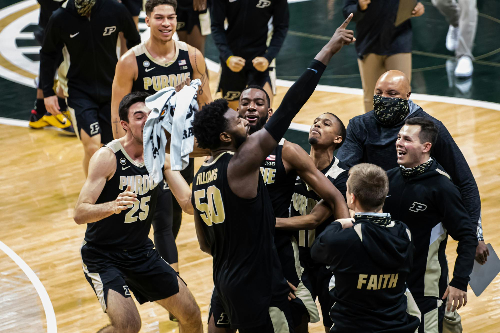 <p>Junior forward Trevion Williams points to the stands in celebration after scoring on the Boilermakers&#x27; last possession to help secure a comeback victory against the Spartans on Jan. 8, 2021.</p>