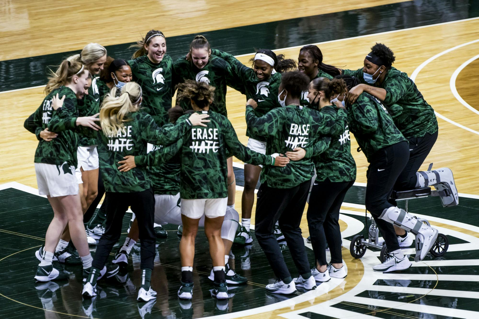 <p>The Michigan State University women&#x27;s basketball team huddles together before their first game against St. Francis PA on Nov. 27, 2020.</p>