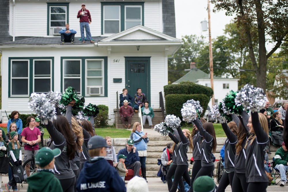 <p>The MSU Dance team walks in the Homecoming Parade on Oct. 2, 2015, on Abbott Road in East Lansing. </p>