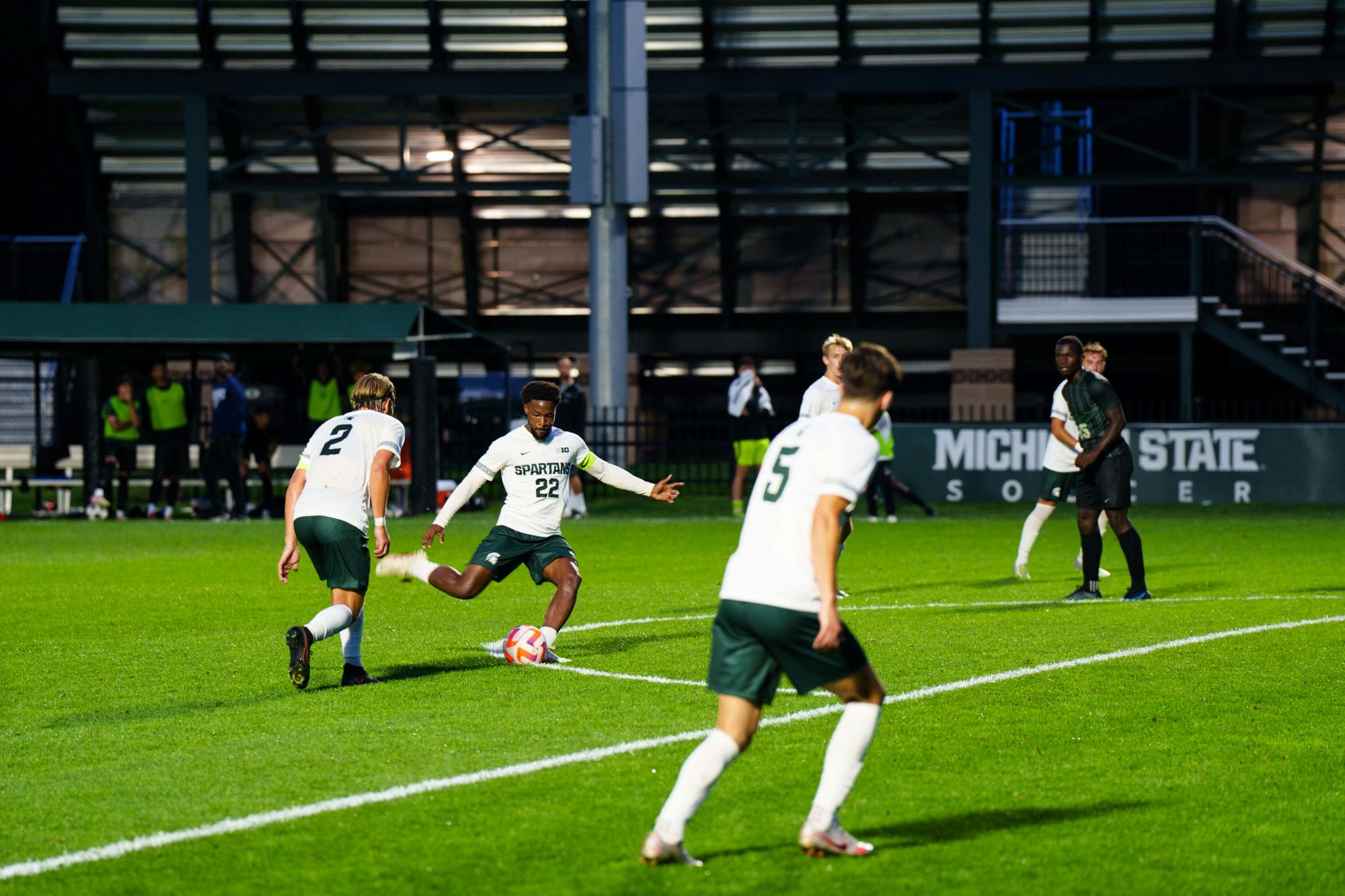 <p>Redshirt Senior Will Perkins (22) makes a shot on goal during an MSU and Chicago State University men's soccer game at DeMartin field in Sept. 12, 2022. The Spartans defeated the Cougars 4-1.</p>