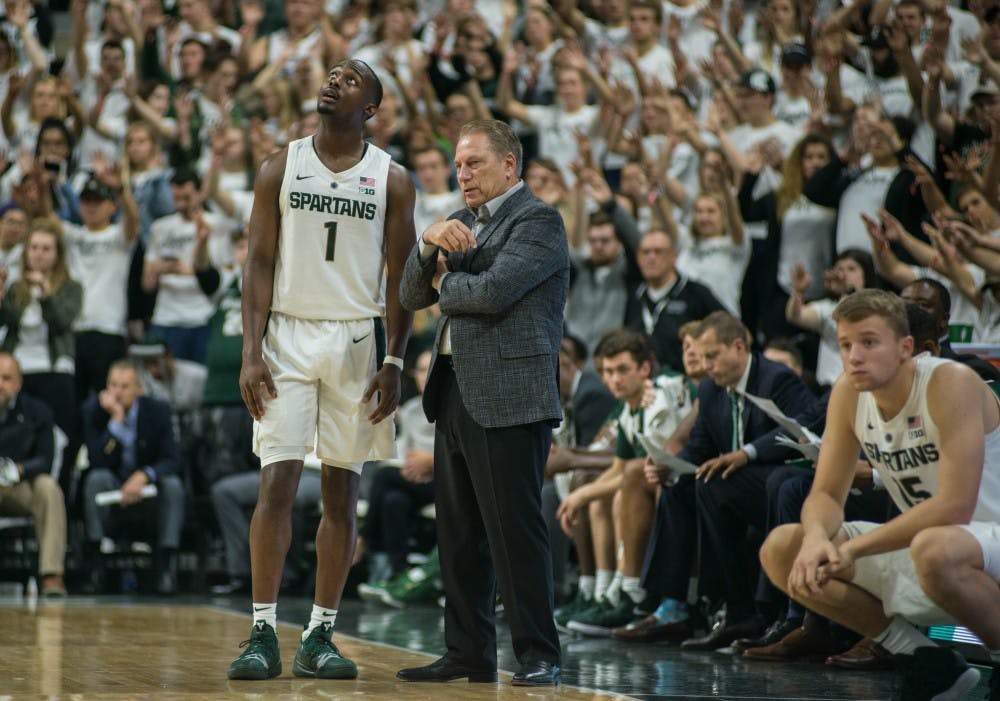 <p>Then-junior guard Joshua Langford (1) talks with Head Coach Tom Izzo during the game against Northern Michigan at Breslin Center on Oct. 30, 2018. The Spartans defeated the Wildcats, 93-47.</p>