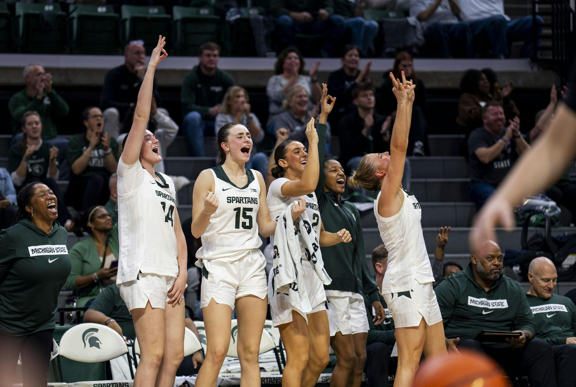 MSU women’s basketball players celebrate after defeating Oakland University 107-42 at the Breslin Student Center on Nov. 5, 2024. 