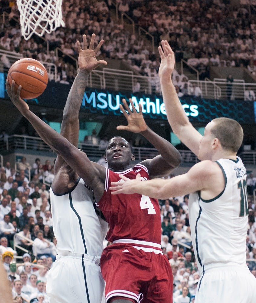 	<p>Indiana&#8217;s guard Victor Oladipo goes up to take a shot as sophomore guard Branden Dawson, left, and freshman forward Matt Costello attempt to block during the game against Indiana on Tuesday night at Breslin Center. </p>