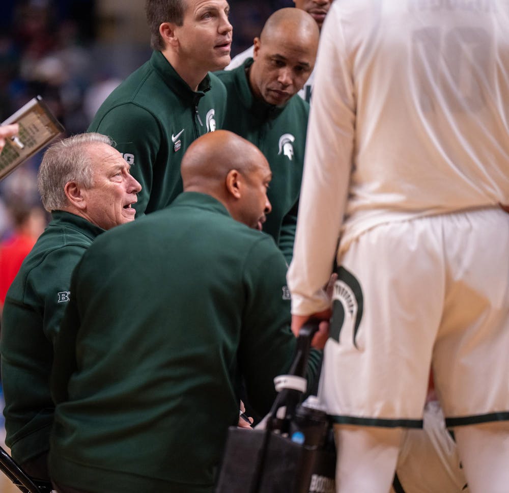 Head coach Tom Izzo coaches his players during a timeout at the March Madness matchup against University of Louisville at the KeyBank Center in Buffalo, New York on March 21, 2026. 