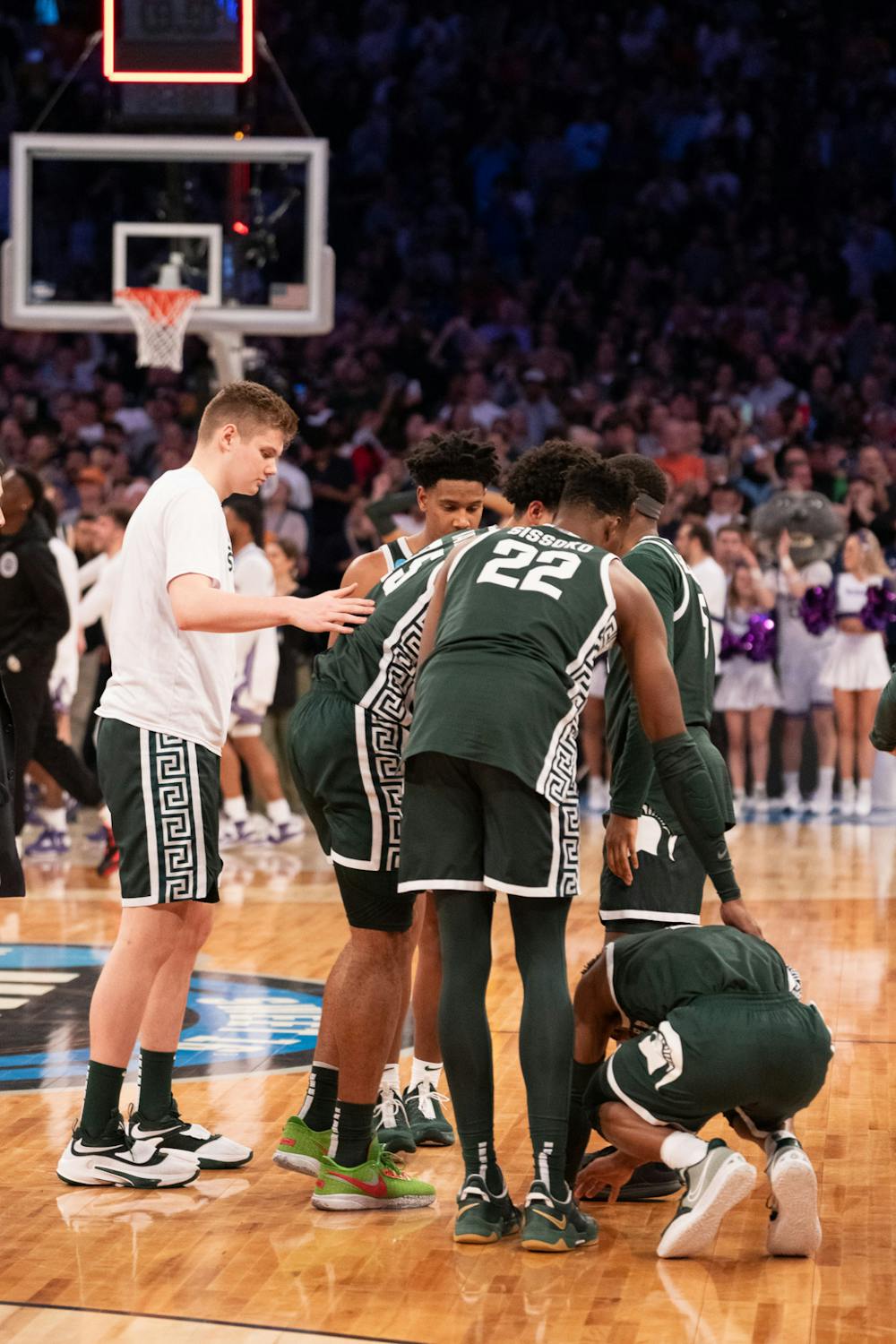 MSU supports each other after a close game during the Sweet Sixteen matchup against Kentucky State University at Madison Square Garden on March 23, 2023. The Spartans fell to the Wildcats with a score of 98-93. 