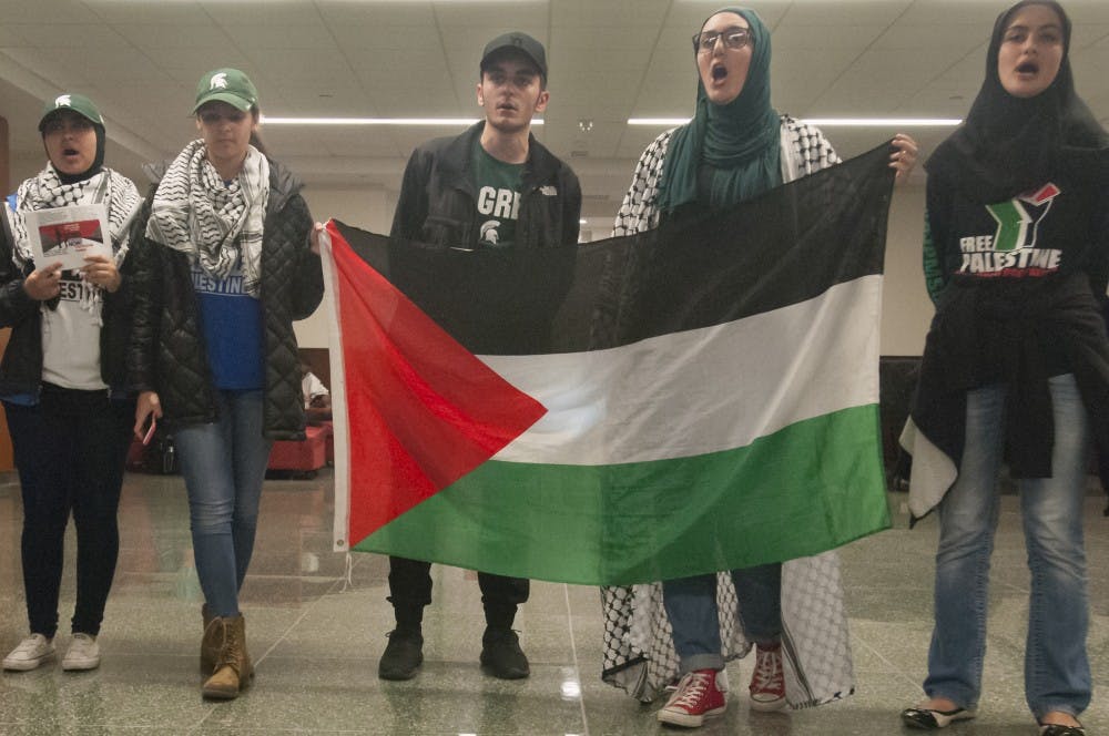 Students protest Israel's treatment of Palestinians on Nov. 16, 2016 in the Union. The protest took place outside of the Israeli Fest put on by the Jewish Student Union.