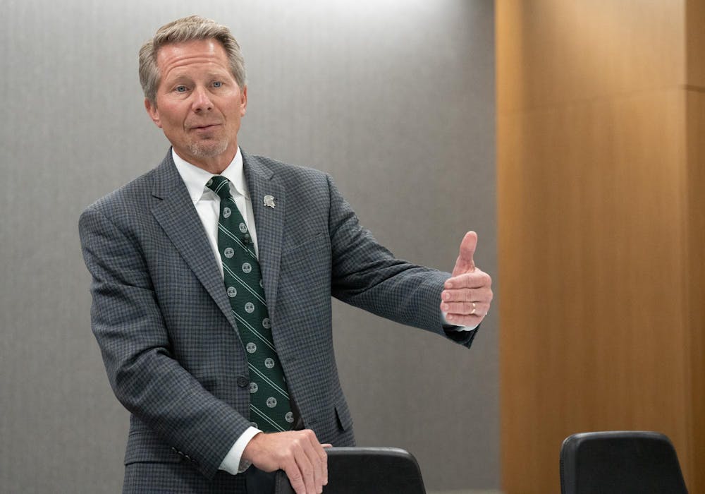 Michigan State University President Kevin Guskiewicz answers media questions after the Oct. 25, 2024 Board of Trustees meeting at the Hannah Administration building.