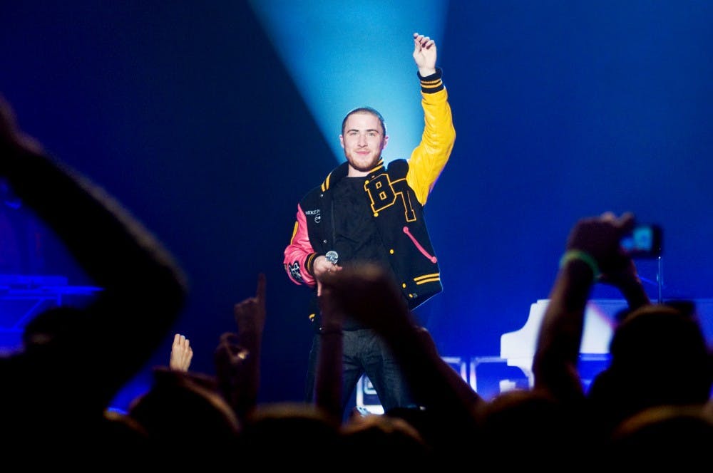 Singer Mike Posner works the crowd Wednesday at the Auditorium. Posner, originally from Southfield, Mich., made a stop in East Lansing for an ASMSU sponsored show in support of his debut album, "31 Minutes to Takeoff." Matt Radick/The State News