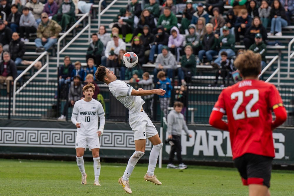 <p>Michigan State University freshman forward Richie Ludwig (10) watches his fellow player catch a ball with his chest at DeMartin Soccer Complex on Oct. 15, 2023.</p>