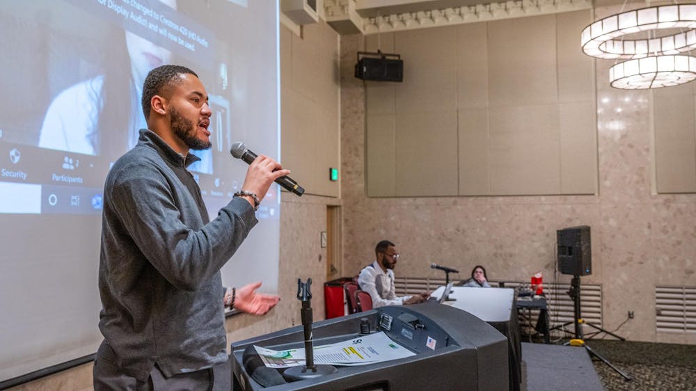 Communications student Brandon Foster introduces the keynote speaker at the annual MLK Student Leadership Conference at the MSU Union on Jan. 13, 2023. Photo courtesy of MSU by Derrick L. Turner. 