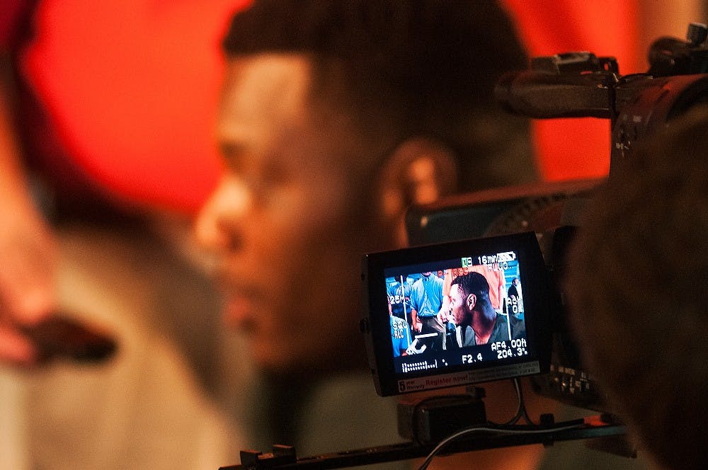 <p>Junior defensive end Shilique Calhoun talks to the media during Football Media Day at the Huntington Club of Spartan Stadium. Coming off of a 13-1 season and a Rose Bowl victory, the Spartans are due to kick off the season Aug. 29. Danyelle Morrow/The State News</p>