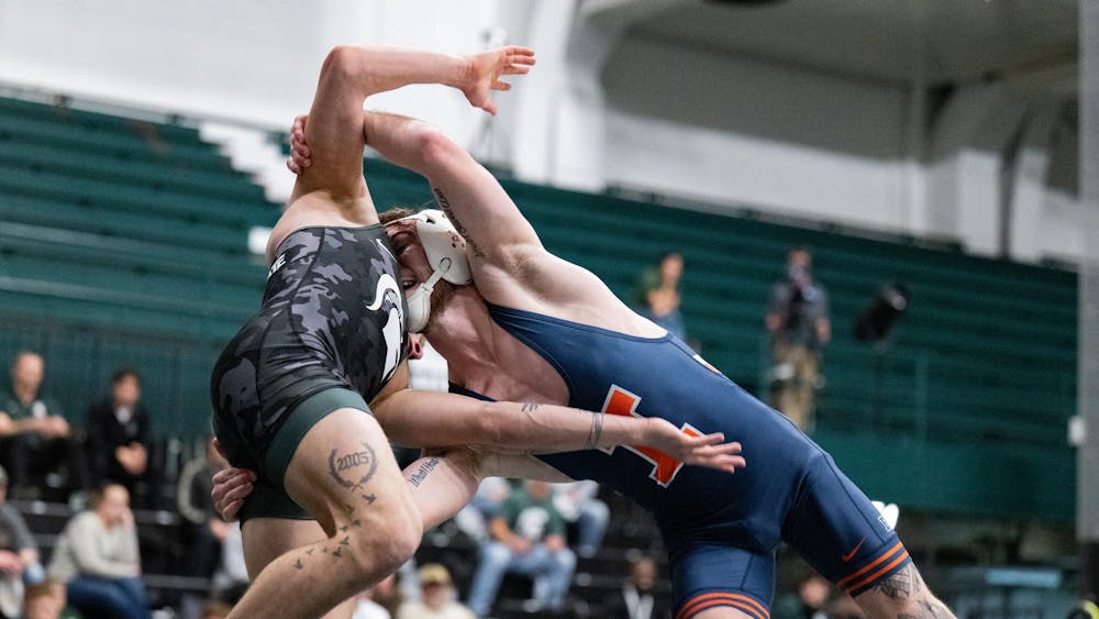<p>Illinois’ Lucas Byrd (133) and Michigan State’s Caleb Weiand (125) battle as the Spartans fell to the Fighting Illini at Jenison Field House on Friday, Jan. 16, 2026.</p>