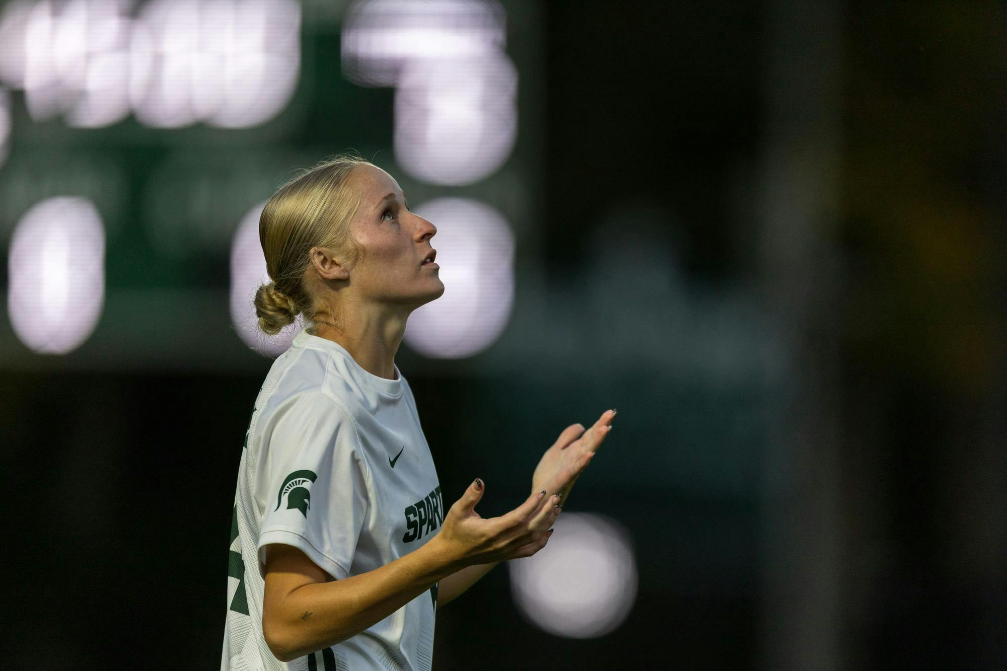 <p>Michigan State junior defender Faith George (14) prays before the soccer game against Minnesota at DeMartin Stadium in East Lansing, Michigan, on Thursday, Oct. 8, 2026.</p>