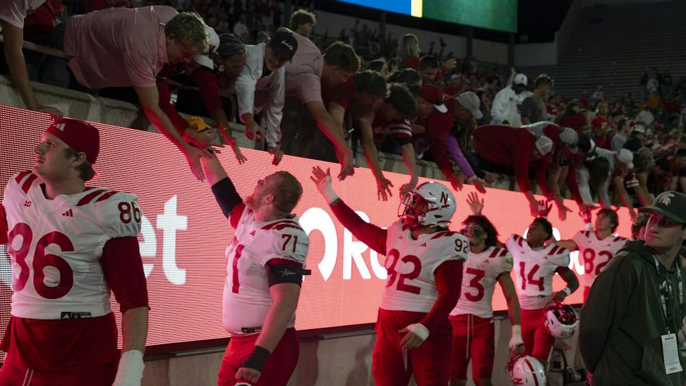 <p>Nebraska players greet fans after the game against Michigan State at Spartan Stadium in East Lansing, Mich., on Saturday, Sept. 26, 2026.</p>