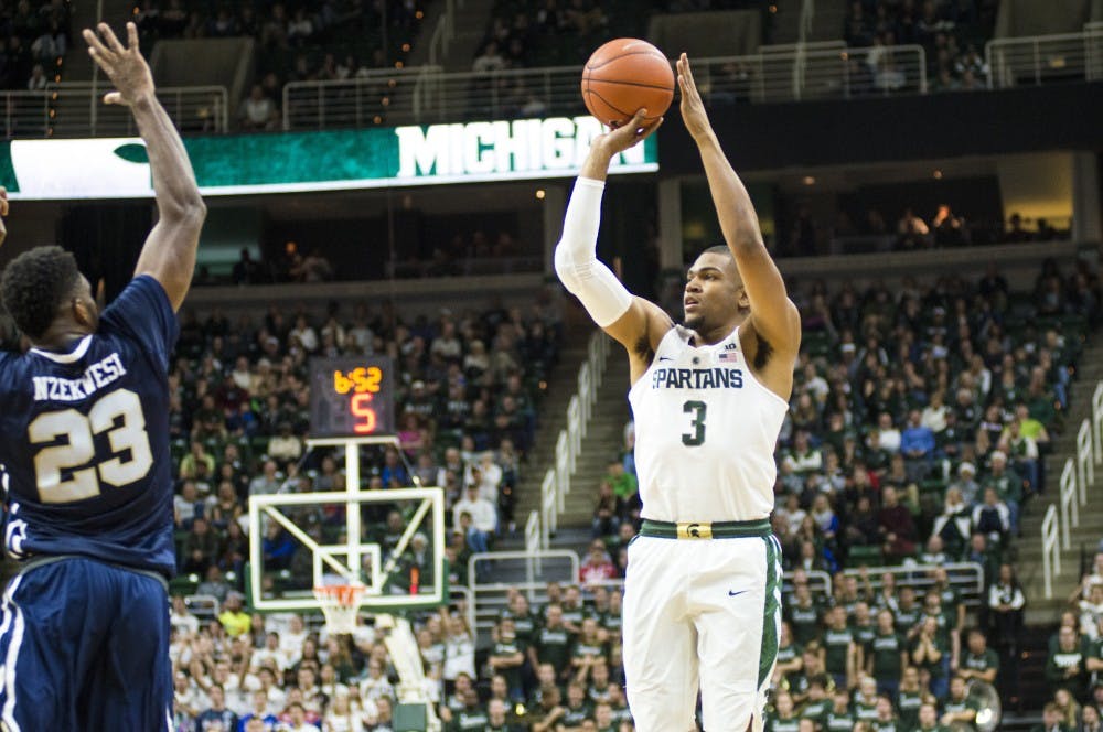 Senior guard Alvin Ellis III (3) shoots the ball during the second half of the men's basketball game against Oral Roberts on Dec. 3, 2016 at Breslin Center. The Spartans defeated the Golden Eagles, 80-76.