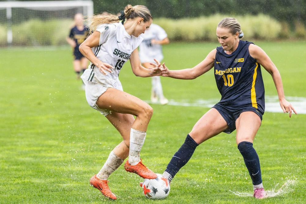 <p>MSU senior midfielder Emerson Sargeant (19) takes on Michigan senior defender Campbell Jewell (10) on the muddy field of DeMartin Stadium as time ticks away in the first half of their game in East Lansing, Mich., on Sept. 20, 2026.</p>