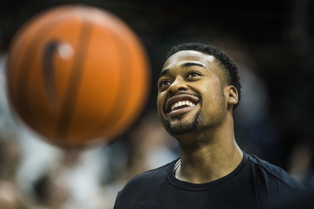 Sophomore forward Nick Ward (44) smiles while warming up before the game against Notre Dame on Nov. 30, 2017 at Breslin Center. The Spartans took down the Fighting Irish, 81-63. 