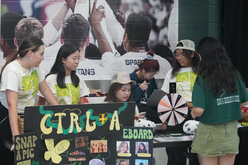 <p>Co-Historian Tina Gentry and members of CTRL+A talk to students as they pass by during Spartan Remix on Sept. 5th, 2024. Spartan Remix is a student event for multicultural student organizations that helps get their name out to new and prospective students.</p>