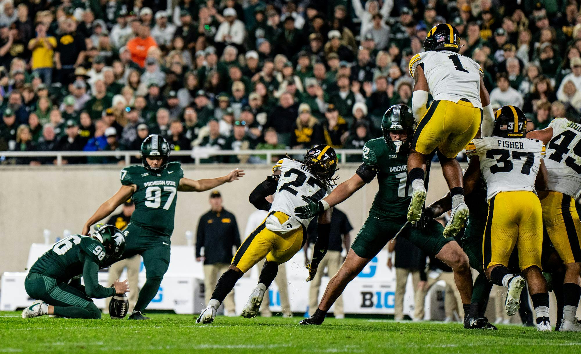 <p>Michigan State University sixth-year kicker Jonathan Kim kicks a field goal during the game against the University of Iowa on Oct. 19, 2024 in Spartan Stadium. Kim made six field goals during the game, setting a school record.</p>