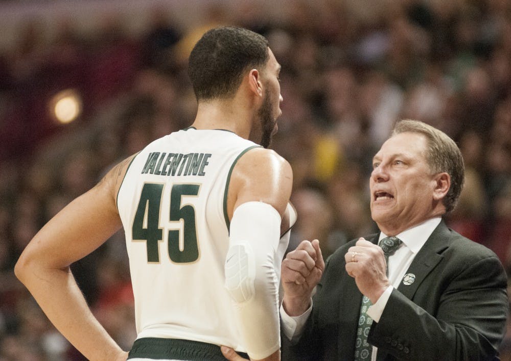 <p>Then junior guard Denzel Valentine talks with Coach Tom Izzo Mar. 13, 2015, during the game against Ohio State at the Big Ten Tournament at United Center in Chicago. The Spartans defeated the Buckeyes, 76-67. Kelsey Feldpausch/ The State News</p>